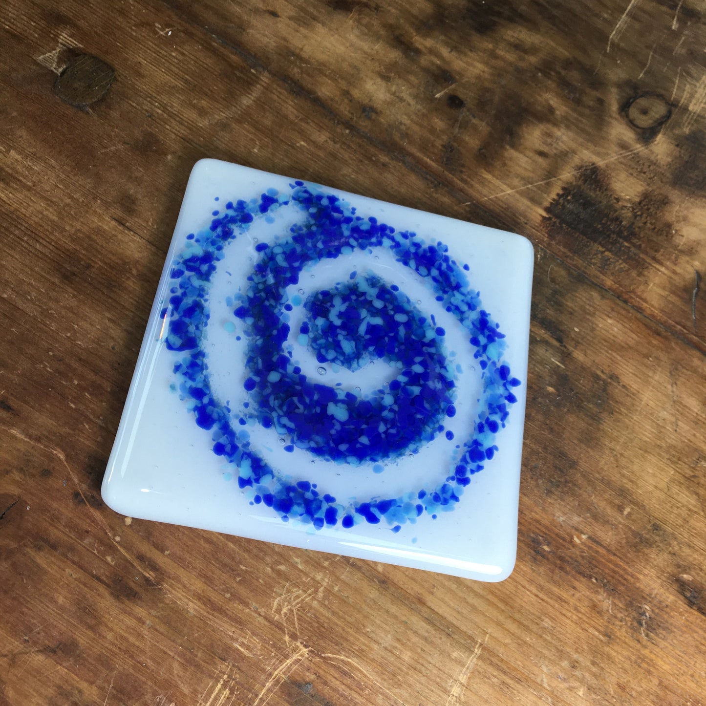 Bristol Blue and light blue swirl on glass coaster.  A handmade glass coaster made at Glass Designs a Bristol  gift shop.