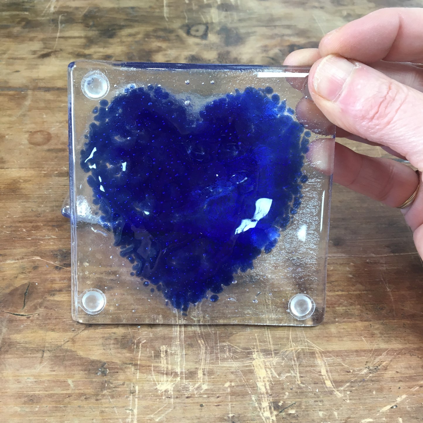 Dadswell Glass, Handmade fused glass coasters, Bristol Blue hearts on clear glass. Beautiful coasters to adorn your home. Made at Glass Designs a Bristol Gift shop.  Edit alt text