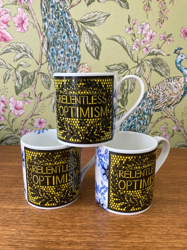 Relentless Optimism bone china mug. Made in Bristol by Stokes Croft China.