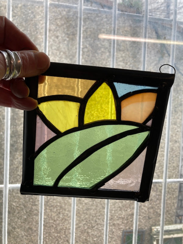 Frida Kahlo inspired stained glass hanging, subtle colours of glass perfect gift for Frida fans.