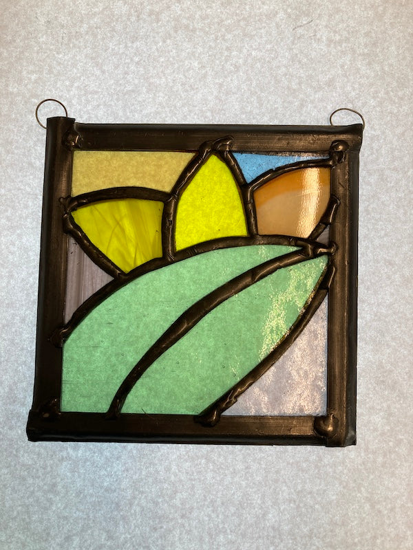 Frida Kahlo inspired stained glass hanging, subtle colours of glass perfect gift for Frida fans.