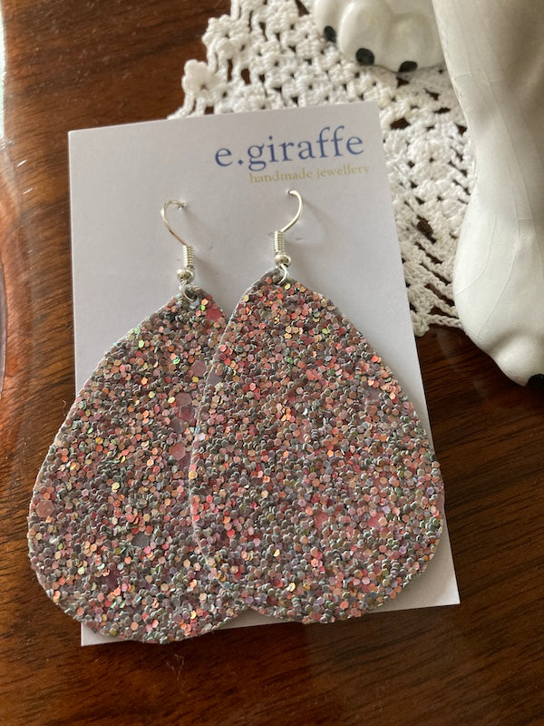 Fabric glitter earrings made by E.giraffe a Bristol independent maker.