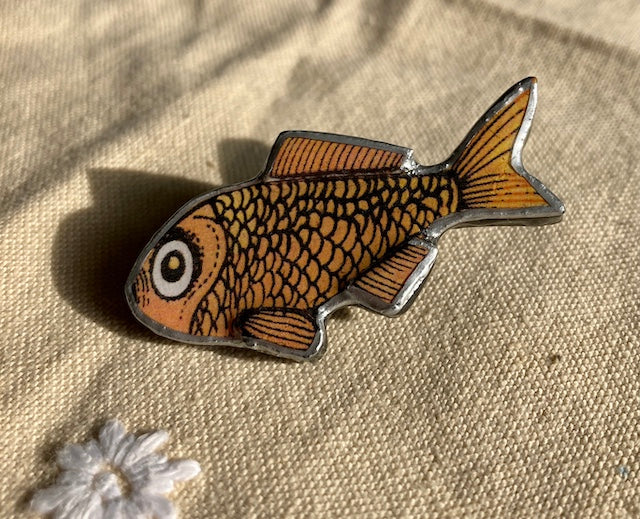 Goldfish brooch, layered paper, metal and resin. Handmade in Cardiff.