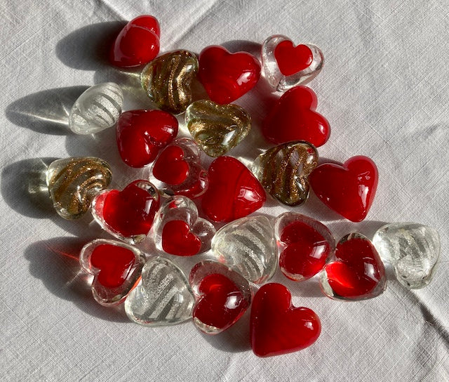 Glass Heart tokens made with a mould.  Measuring 2.5 cm.  A perfect token to show your love for someone.