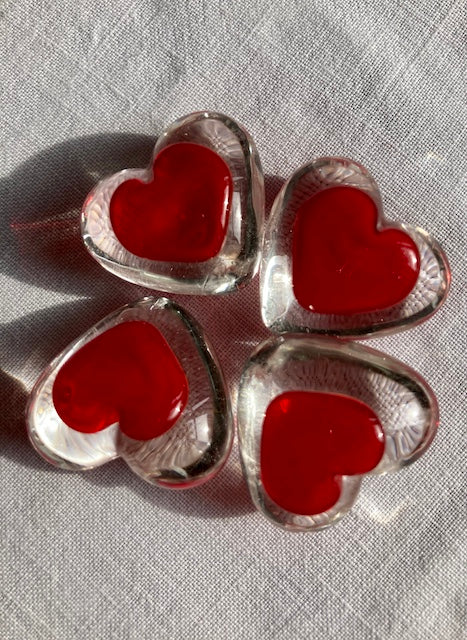 Glass Heart tokens made with a mould. Measuring 2.5 cm. A perfect token to show your love for someone.