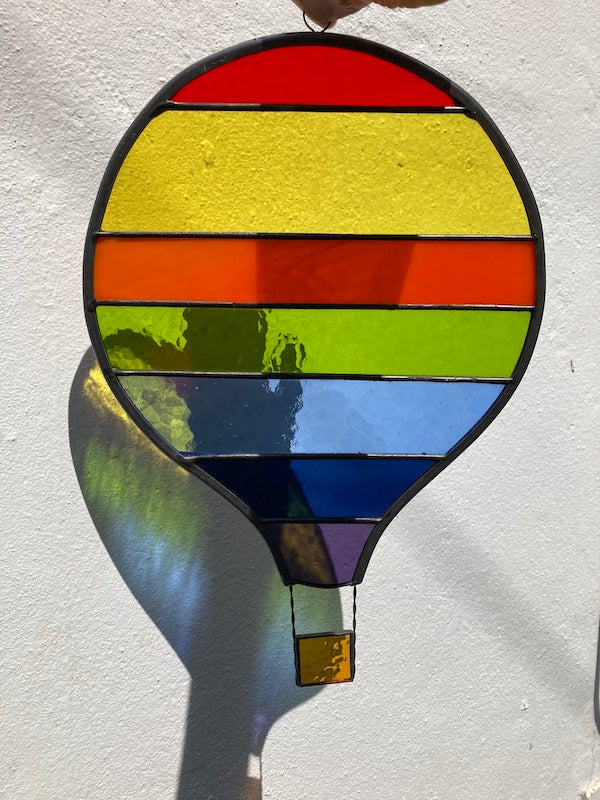 Stained Glass Rainbow Striped Hot Air Balloon, made Dadswell Glass at Glass Designs a Bristol Gift shop.