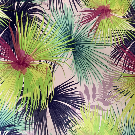 A bold and vibrant design of overlapping palm leaves on a pale pink background