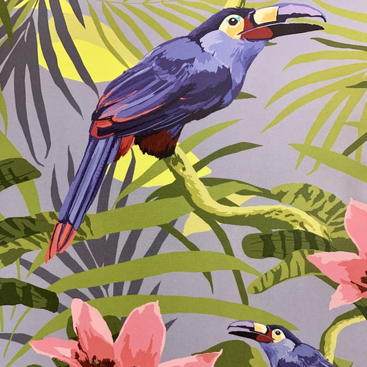 A bold and vibrant design of purple toucans amid pink bromeliad flowers and overlapping palm leaves