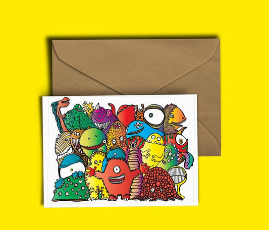 Glass Designs Dixon Does Doodles card with a group of colourful happy monsters