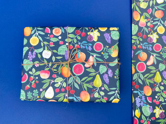 Wrapping paper with colourful summer fruits on dark blue background