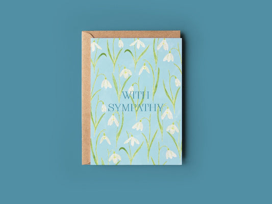 With Sympathy card with white snowdrops on pale blue background