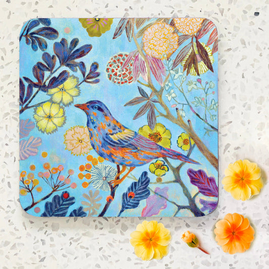 Coaster with colourful bird surrounded by flowers illustration. Sky blue background