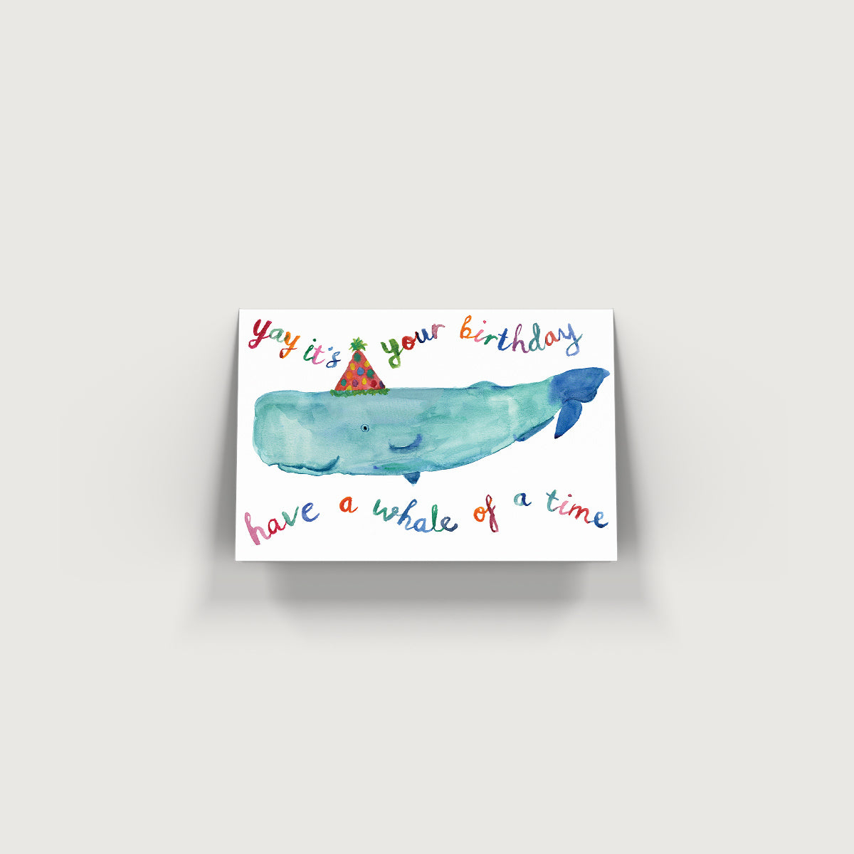 Bristol based watercolour illustrator, Rosie Webb.  Yay its your birthday have a whale of a time, water colour of a whale in a party hat.