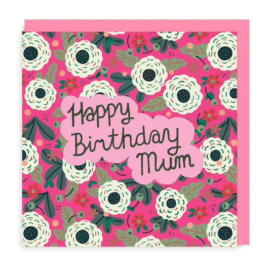 Card with Happy Birthday Mum message handwritten. Pink and white flowers background