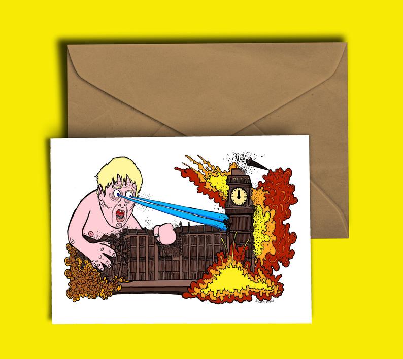 Glass Designs Dixon Does Doodles card with a picture of giant Boris Johnson blowing up the houses of parliment with his lazer eyes