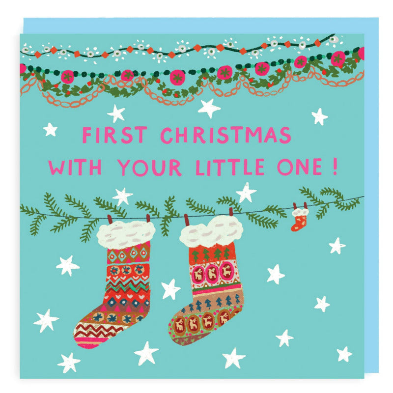 New Baby Christmas card with stockings and decorations colour illustration with pale blue background.
