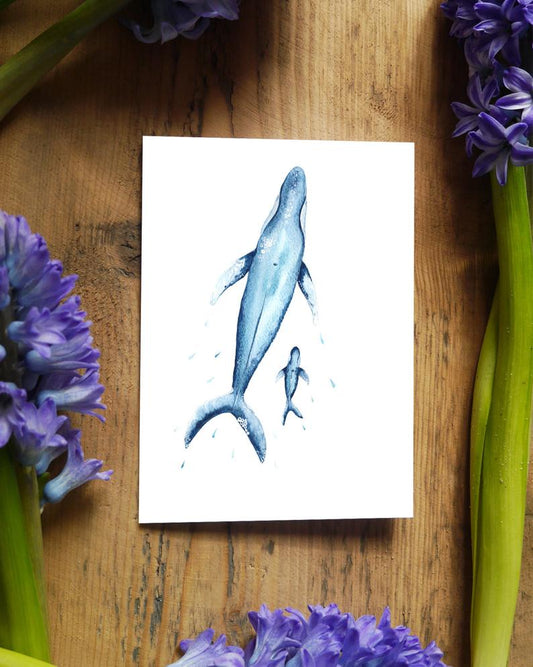 watercolour greetings card with a big mum whale and a baby whale 