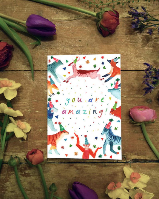 watercolour greetings card with animals in party hats and the words ''you are amazing''