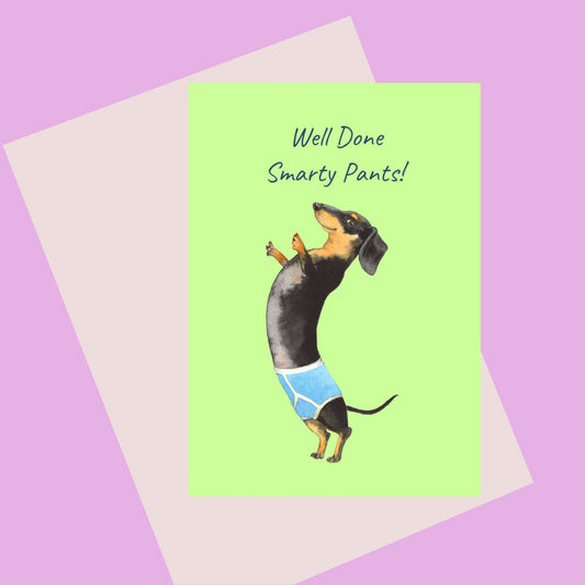 Well Done Smarty Pants! Illustration of a Dachshund  standing on its hind legs in mens underpants.  Designed in Bristol.