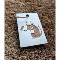 Famous Banksy images laser cut in wood keyring