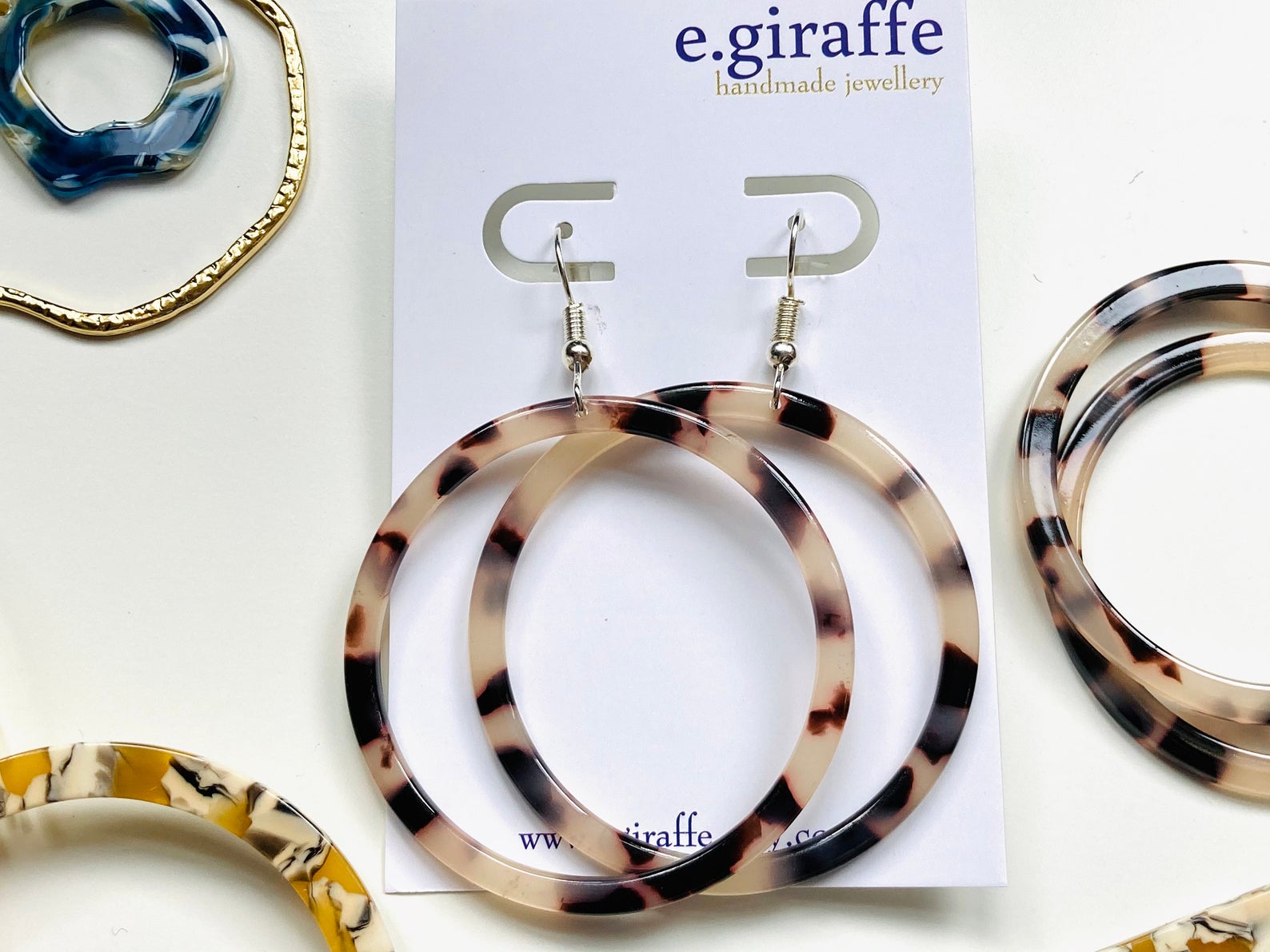 A Tortoiseshell resin hoop earring made by EGiraffe in Bristol