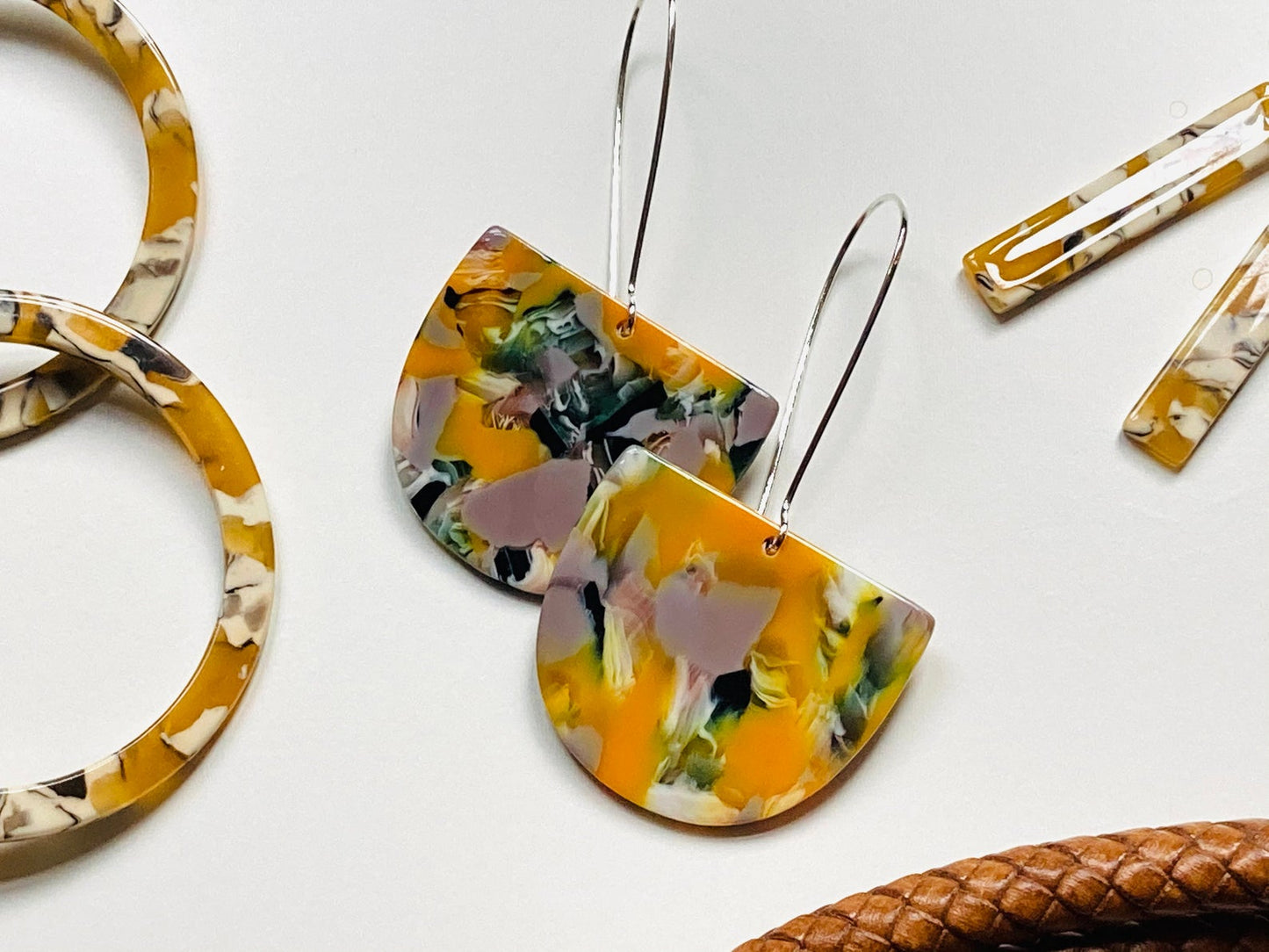 Yellow/Grey Resin earrings with silver plated ear hooks.