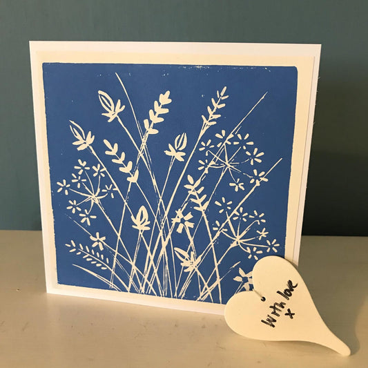 A beautiful single colour hand printed lino print of meadow flowers in Turquoise, or Black or  yellow.  Handmade in Bristol.