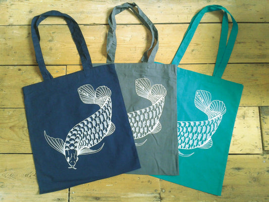 Stylish tote bag with a white carp hand printed in Bristol