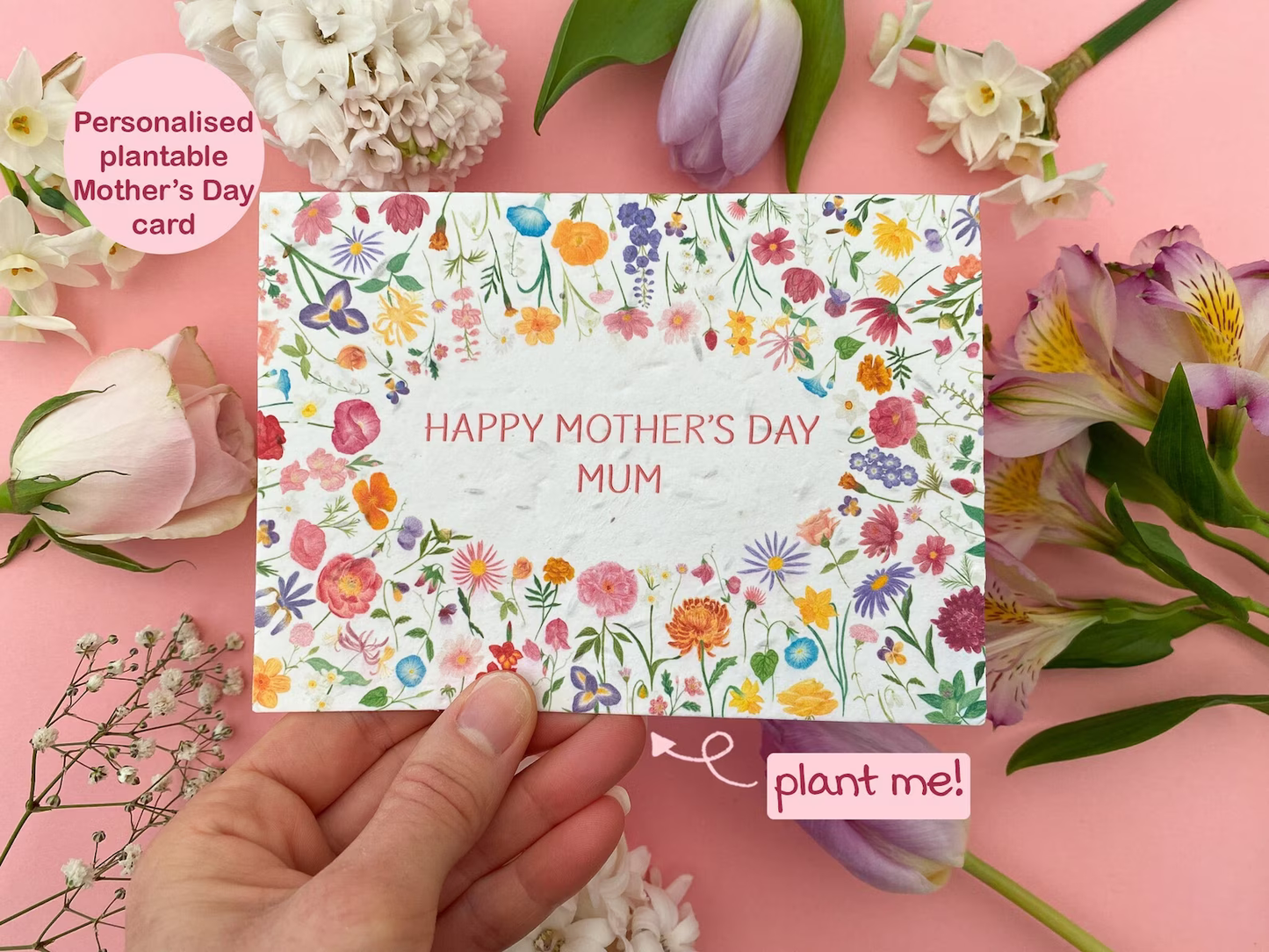 Floral drawing of flowers surrounding the words Happy Mother's Day Mum printed on seeded paper .