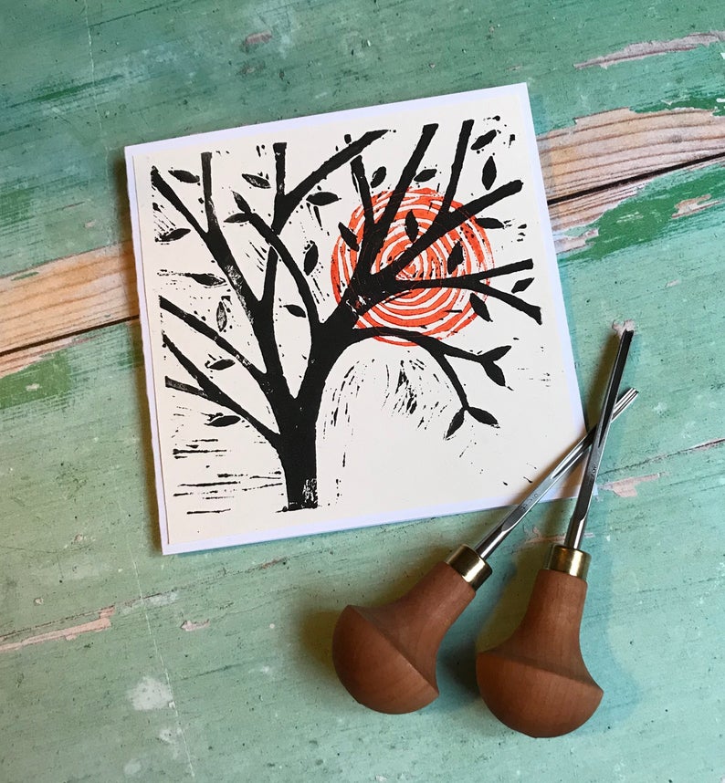 Tree with a red sun, this card a hand printed lino cut. Perfect greetings card for any occasion, blank inside for your own message.