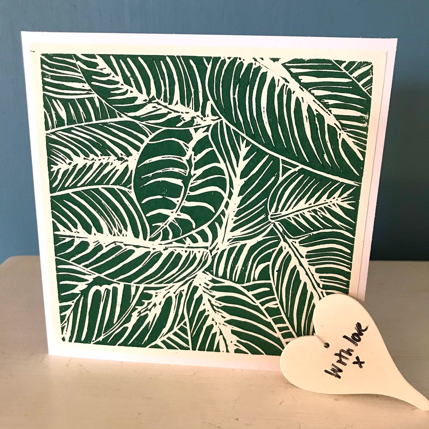 Botanical 1.  Handcut lino, individually printed lino cut.  Design of leaves in Dark Green on a cream background. Card is blank in side.  Perfect for any occasion.