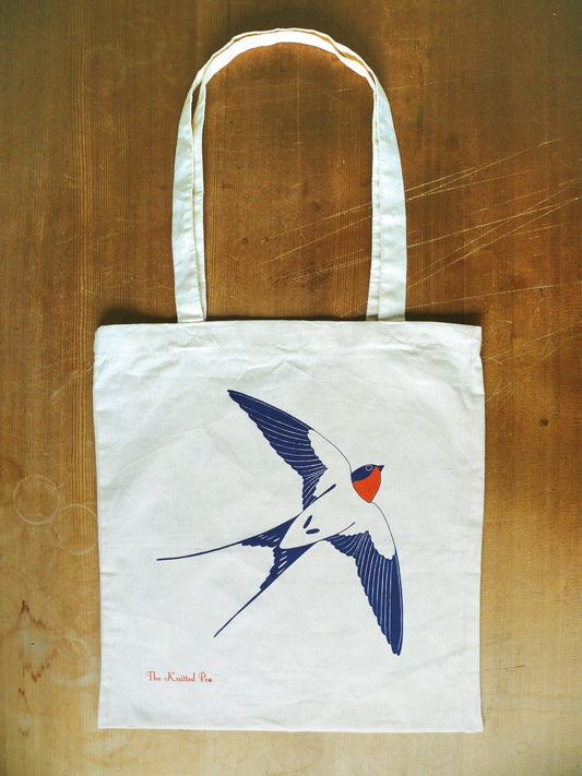100 % cotton tote bag with a flying swallow printed on one side. Handmade in Bristol.