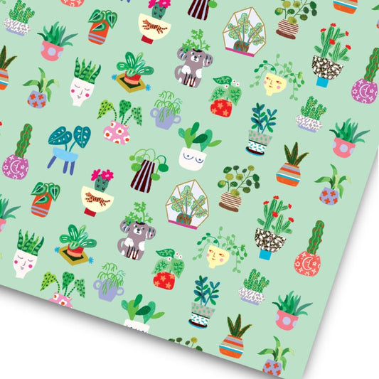 Wrapping paper with folk art style potted plants on pale green background