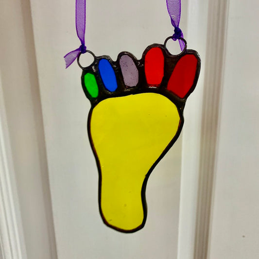 A colourful Glass Footprint Suncatcher